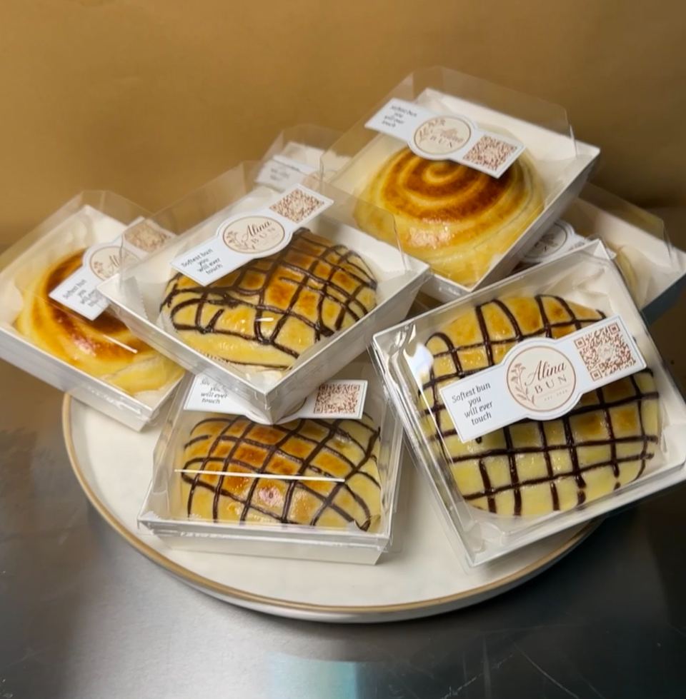 Boxed chocolate and cream buns with the Alina Bun label